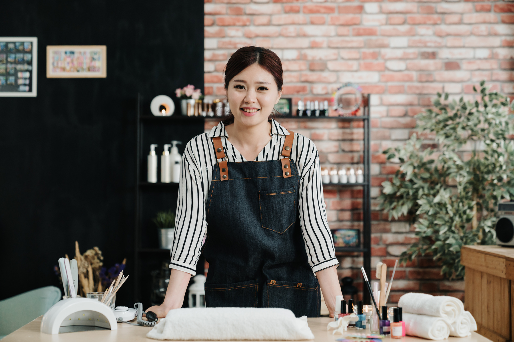 Woman Working in a Nail Salon